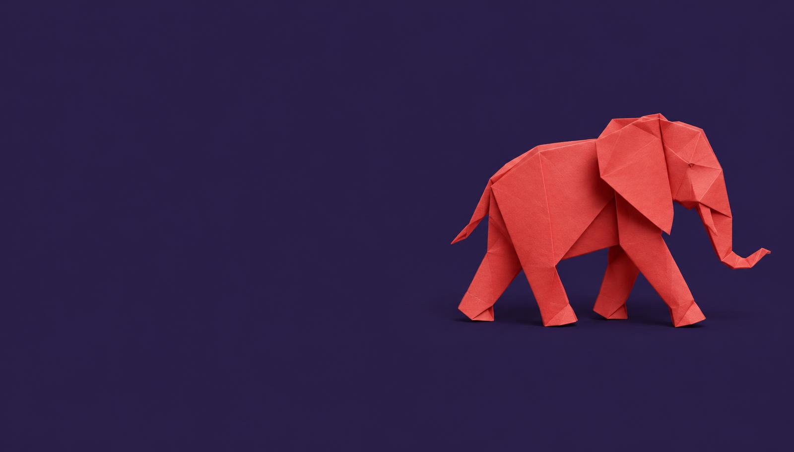 Coral origami elephant